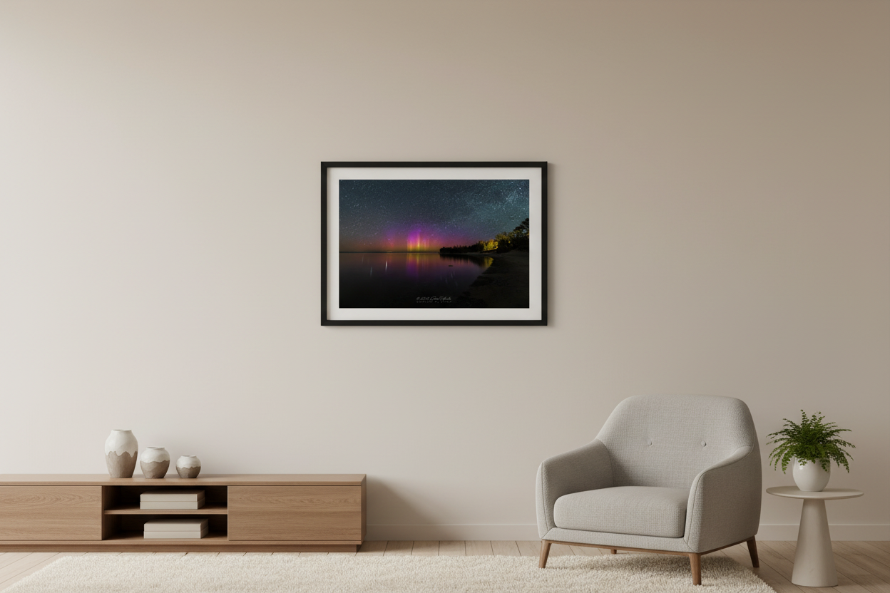 Small fine art landscape print of vivid yellow-green magenta and purple Northern Lights aurora borealis pillars reflecting in calm Lake Michigan from Gills Pier Leelanau County Michigan May 6 2024 displayed in modern living room