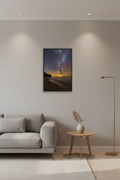 Small fine art portrait print of the Milky Way rising over Lake Michigan from Christmas Cove Beach Northport Michigan October 22 2022 at 10:08pm with warm golden horizon glow and sandy beach foreground displayed in modern living room