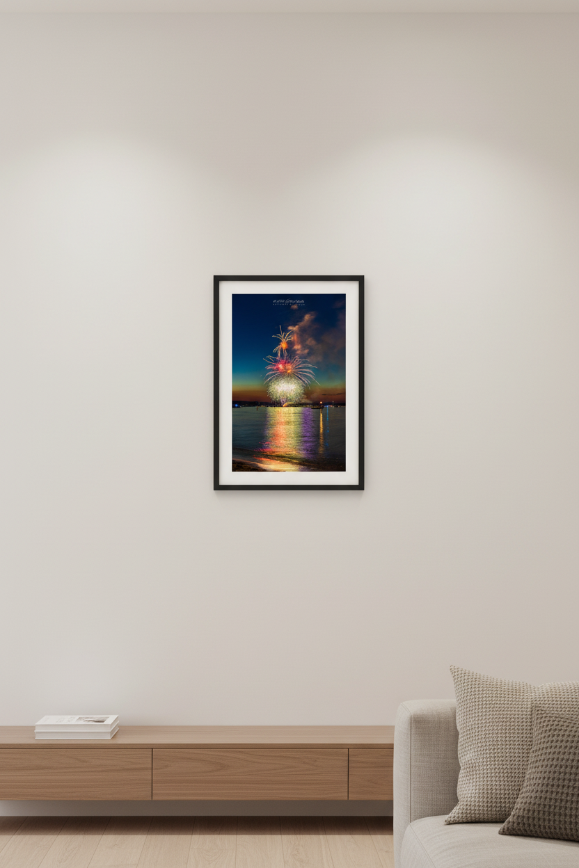 Small fine art portrait print of Traverse City Cherry Festival 2024 finale fireworks featuring golden palm tree burst red purple peony and silver sparkler over Grand Traverse Bay from Clinch Park Beach displayed in modern living room