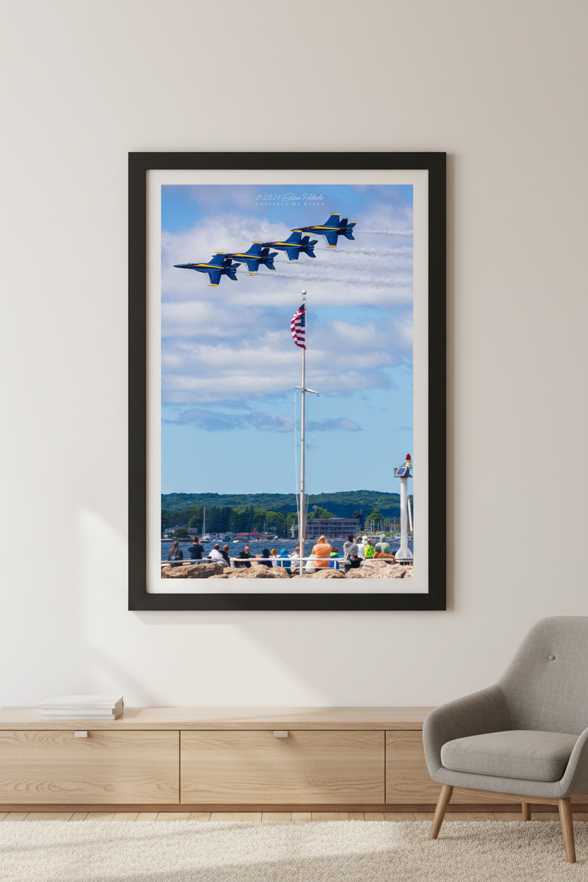 Large fine art portrait print of Blue Angels in diamond formation flying over American flag during 2024 Cherry Festival Airshow Traverse City Michigan June 30 2024 displayed in modern living room