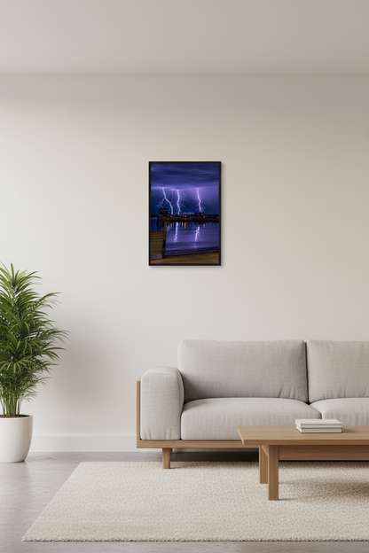 Small fine art portrait print of triple lightning strike above Leland Michigan displayed in modern living room