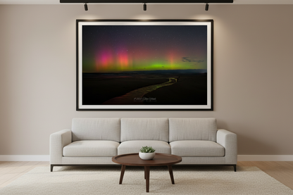Large fine art landscape print of aurora borealis pillars over a winding creek at Magoon Creek Natural Area Manistee County Michigan displayed in modern living room