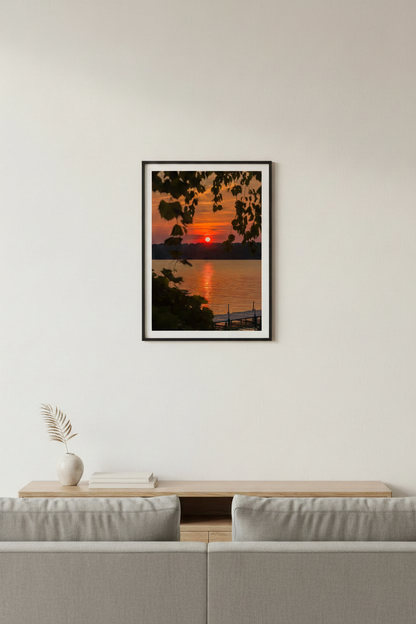 Small fine art portrait print of peaceful framed sunrise over Lake Leelanau Michigan with dock displayed in modern living room