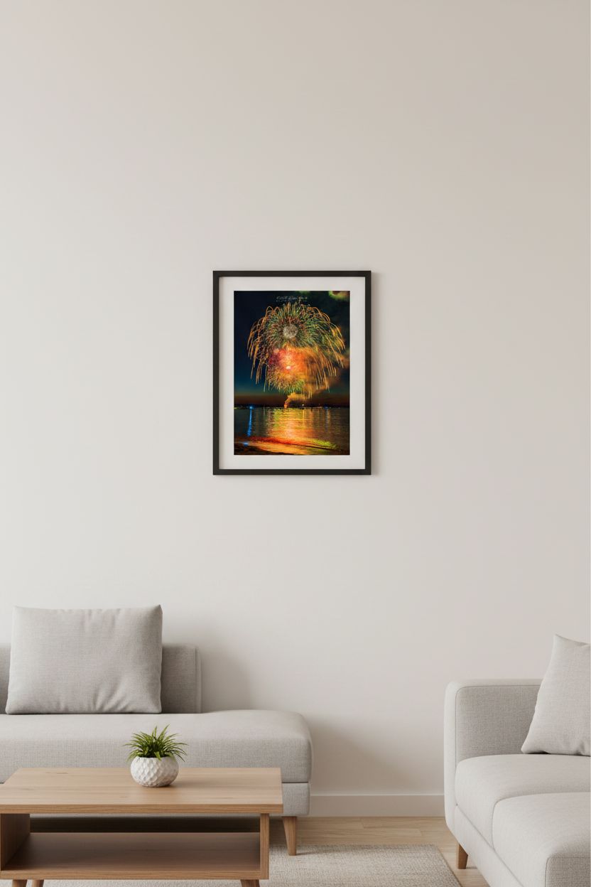 Small fine art portrait print of Traverse City Cherry Festival 2024 finale fireworks featuring multi-level green willow canopy with layered gold pink and white bursts over Grand Traverse Bay from Clinch Park Beach displayed in modern living room