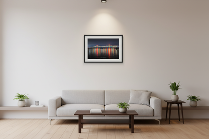 Small fine art landscape print of illuminated Mackinac Bridge at night displayed in modern living room