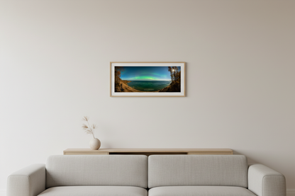 Small fine art 3:1 panoramic print of northern lights aurora borealis arc over Lake Superior from Log Slide Overlook Grand Sable Dunes Michigan Upper Peninsula October 2024 displayed in modern living room