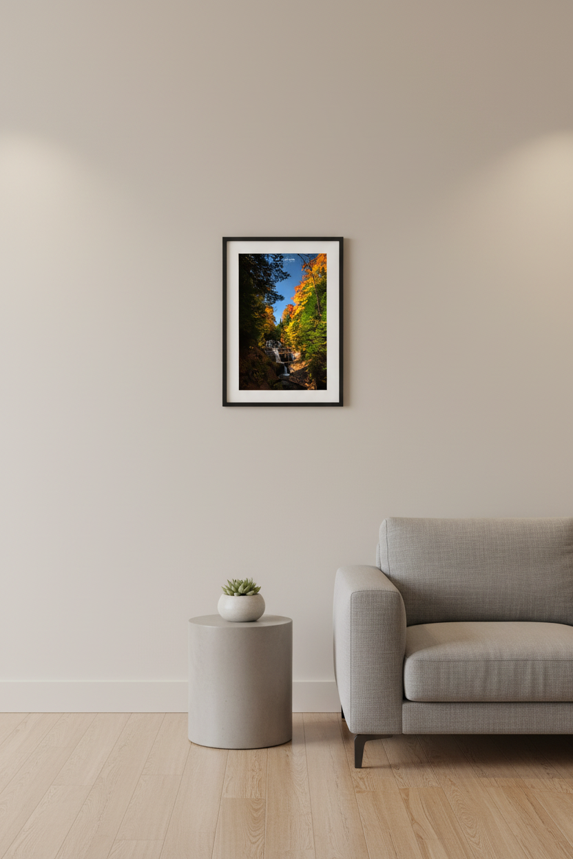 Small fine art portrait print of Sable Falls in autumn moonlight at Pictured Rocks displayed in modern living room