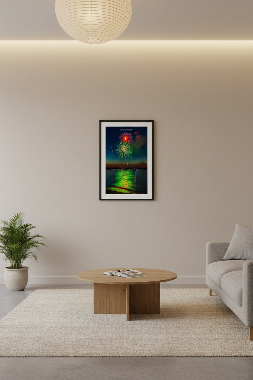 Small fine art portrait print of Traverse City Cherry Festival 2024 finale fireworks featuring red and green dual burst with launch trail reflecting over Grand Traverse Bay from Clinch Park Beach displayed in modern living room